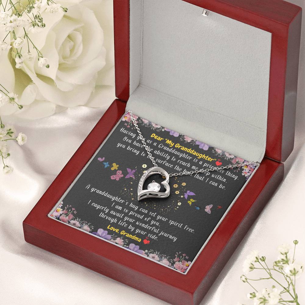 To My Granddaughter A Granddaughter’s Hug Can Set Your Spirit Free From Grandma 1 Forever Love Necklace
