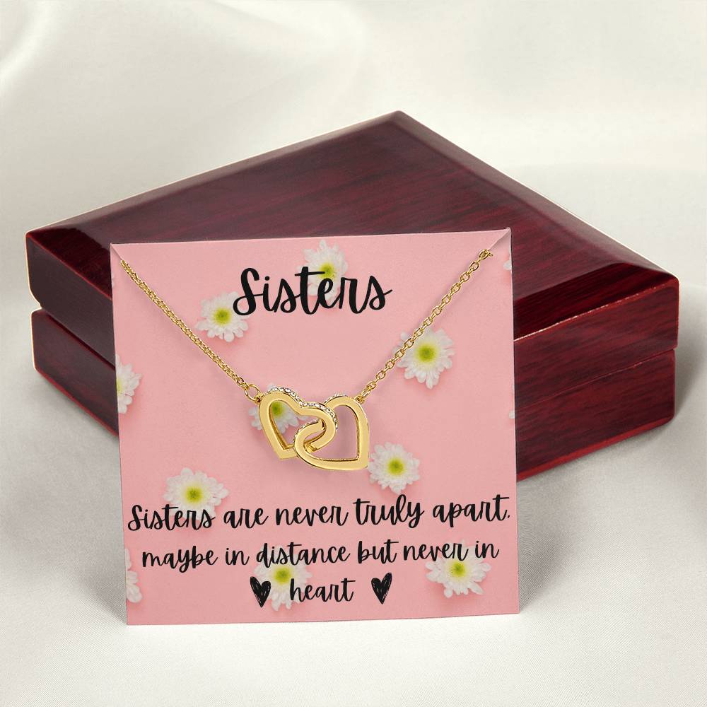 Sisters - Interlocking Necklace - Daisy Background Interlocking Hearts Necklace