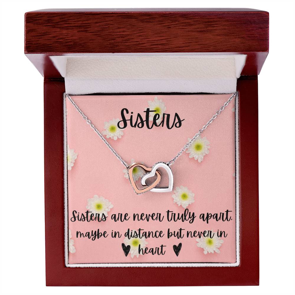 Sisters - Interlocking Necklace - Daisy Background Interlocking Hearts Necklace