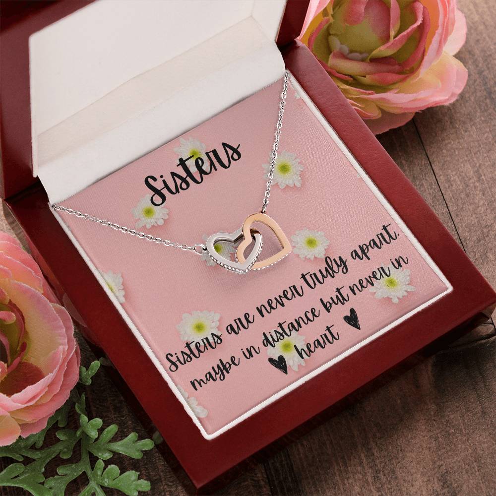 Sisters - Interlocking Necklace - Daisy Background Interlocking Hearts Necklace