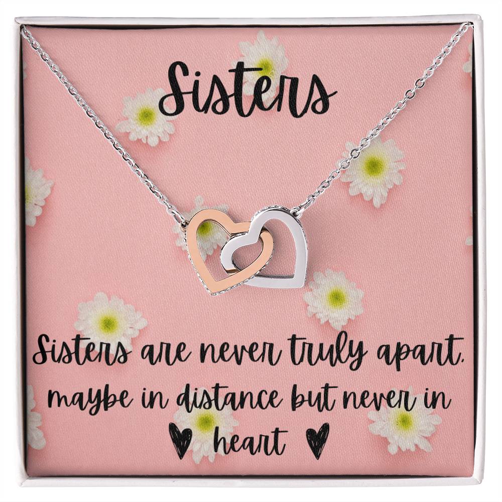 Sisters - Interlocking Necklace - Daisy Background Interlocking Hearts Necklace