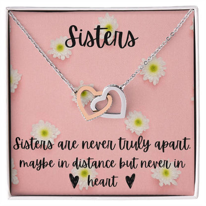 Sisters - Interlocking Necklace - Daisy Background Interlocking Hearts Necklace