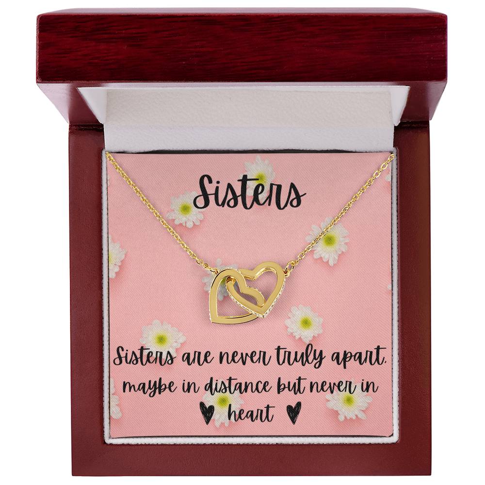 Sisters - Interlocking Necklace - Daisy Background Interlocking Hearts Necklace