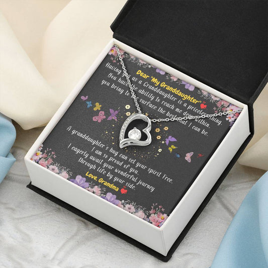 To My Granddaughter A Granddaughter’s Hug Can Set Your Spirit Free From Grandma 1 Forever Love Necklace