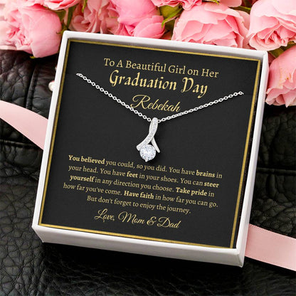 To A Beautiful Girl On Her Graduation Day -  Ribbon Necklace - Love Mom & Dad Alluring Beauty Necklace